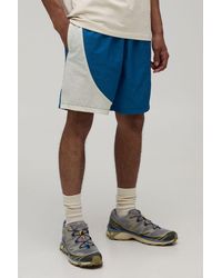 BoohooMAN - Relaxed Fit Curved Panel Mid Length Nylon Shorts - Lyst