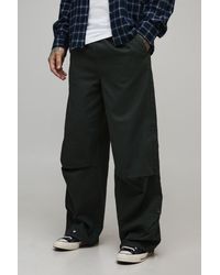 BoohooMAN - Tall Elasticated Waist Oversized Hem Popper Trousers - Lyst