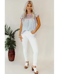Azura Exchange - Luchtblauwe Boho Geborduurde Bloemenprint Blouse Met Vlindermouwen - Lyst