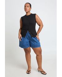 Boohoo - Plus Denim Elasticated Waist Flippy Short - Lyst
