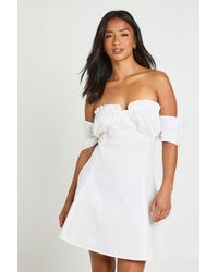 Boohoo - Petite Ruched Bust Bardot Mini Dress - Lyst