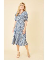 Yumi' - Animal Print Wrap Midi Skater Dress - Lyst