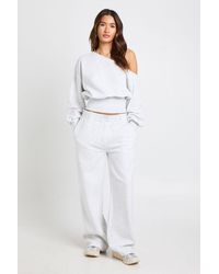 Boohoo - Off Shoulder Cinched Waist Sweatshirt - Lyst