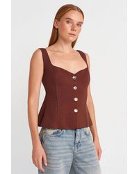 Dilvin - Aansluitende Mouwloze Peplum Blouse - Lyst