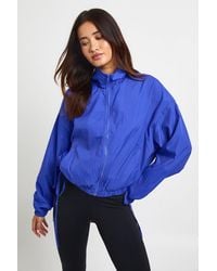 Boohoo - Tie Side Funnel Neck Lightweight Jacket - Lyst