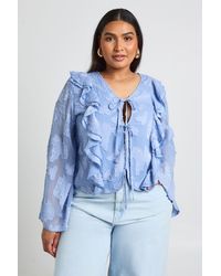 Boohoo - Plus Burnout Ruffle Front Tie Blouse - Lyst