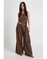 Boohoo - Pleated Wide Leg Peached Stripe Trouser - Lyst
