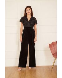 Yumi' - Sequin Embellished Velvet Jumpsuit With Angel Sleeves - Lyst