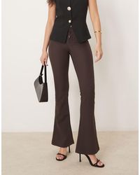 Gina Tricot - Low Rise Flare Leg Stretch Trousers - Lyst