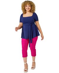 Roman Curve - Stretch Belted Peplum Top - Lyst