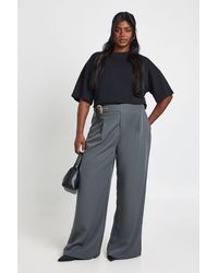 Boohoo - Plus Low Rise Belted Straight Leg Trousers - Lyst