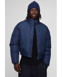 BoohooMAN - Oversized Boxy Piping Panel Funnel Neck Puffer Jacket - Lyst