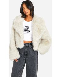 Boohoo - Petite Vintage Look Faux Fur Coat - Lyst