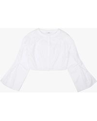 YIBRI - Cropped Blouse With Crochet Flower And Smocked Bell Sleeves - Lyst