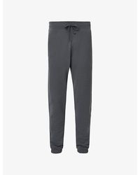 AllSaints - Raven Logo-Embroidered Cuffed Cotton-Jersey Jogging Bottoms - Lyst