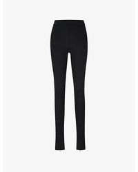 BOSS - X Naomi Campbell Zipped-hem Slim-fit High-rise Stretch-recycled Jersey Trousers - Lyst