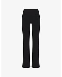 Skims - Outdoor Bootcut High-rise Stretch Cotton-blend leggings - Lyst