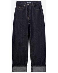 Prada - Logo-plaque Contrast-stitch Wide-leg Jeans - Lyst