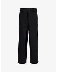 Givenchy - Brand-appliquéd Pleated Regular-fit Wide-leg Woven Trousers - Lyst