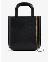 Saint Laurent - All Over Logo-embossed Leather Tote Bag - Lyst