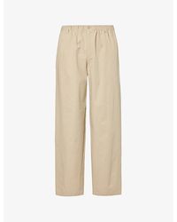 Gucci - Brand-embroidered Tapered-leg Relaxed-fit Cotton Trousers - Lyst