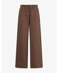 The North Face - Embroidered-Logo Wide-Leg Cotton-Blend Jogging Bottoms - Lyst