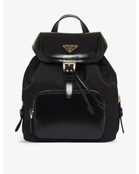 Prada - Re-nylon Medium Brand-plaque Recycled-polyamide And Brushed Leather Backpack - Lyst