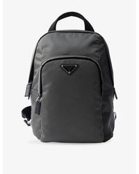Prada - Logo-Plaque Re-Nylon And Saffiano-Leather Backpack - Lyst