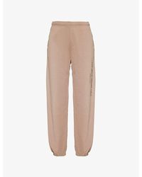 Sporty & Rich - Brand-Print Two-Slip-Pockets Straight-Leg High-Rise Cotton-Jersey Jogging Bottoms - Lyst