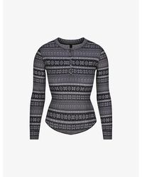 Skims - Plush Pointelle Logo-Print Stretch-Jersey Henley Top - Lyst