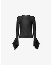 Alaïa - Bell Sleeve Knitted Top - Lyst