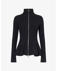 Alaïa - Ribbed Peplum-Hem Wool-Blend Cardigan - Lyst