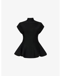 KHAITE - Andra Stand-Collar Knit Top - Lyst