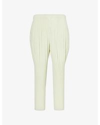 Homme Plissé Issey Miyake - Pleated Tapered-leg Relaxed-fit Knitted Trousers - Lyst