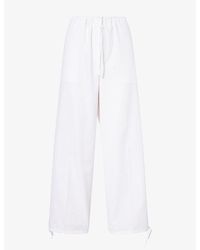 TOTEME - Drawstring Cotton Trousers - Lyst