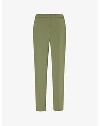 Theory - Pressed-crease Tapered-leg Mid-rise Crepe Trousers - Lyst