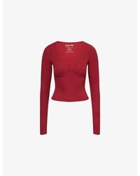BO+TEE - Ribbed V-Neck Stretch-Woven Top - Lyst