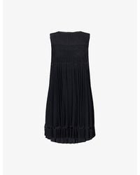 Alaïa - Noir Pleats A-Line Knitted Mini Dress - Lyst
