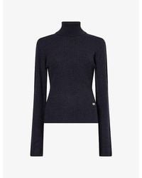 Ganni - Ribbed Turtleneck Wool-Blend Jumper - Lyst