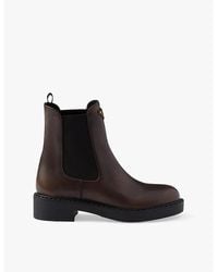 Prada - Triangle-Plaque Leather Chelsea Boots - Lyst