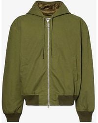 Acne Studios - Padded Relaxed-fit Cotton-canvas Hooded Bomber Jacket - Lyst