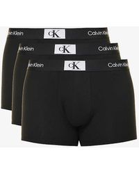 Calvin Klein - Logo-waistband Mid-rise Pack Of Three Stretch-cotton Trunks - Lyst