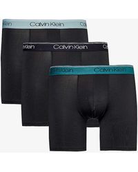Calvin Klein - Branded-waistband Mid-rise Pack Of Three Stretch-woven Boxer Briefs - Lyst