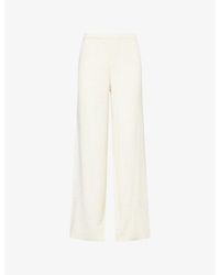 The Couture Club - Logo-Embroidered Straight-Leg Stretch-Knit Trousers - Lyst
