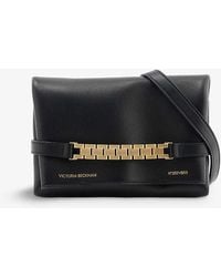 Victoria Beckham - Chain-embellished Mini Leather Pouch Bag - Lyst