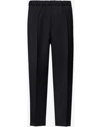 Jil Sander - Relaxed-fit Tapered Wool Trousers - Lyst