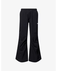 The North Face - Logo-Print Wide-Leg Woven Nylon Trousers - Lyst