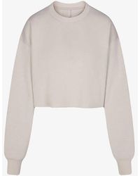 Skims - Loose-fit Cropped Cotton-blend Sweatshirt X - Lyst