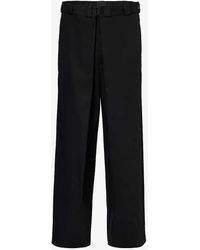 Givenchy - Brand-appliquéd Pleated Regular-fit Wide-leg Woven Trousers - Lyst