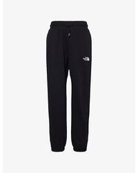 The North Face - Essential Relaxed Brand-Embroidery Cotton-Blend Jogging Bottoms - Lyst